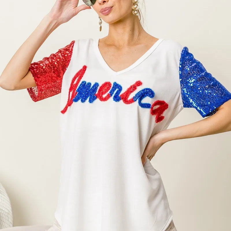 BiBi Metallic Letter V-neck Sequin Sleeves Top in Cream